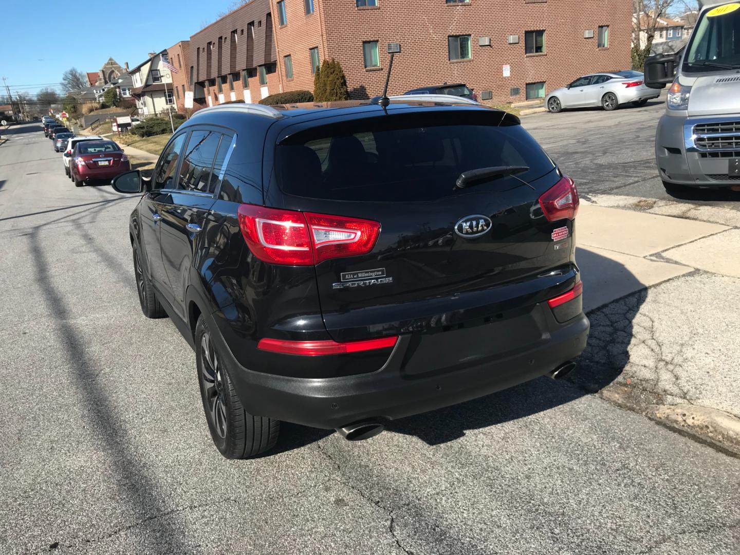 2012 Black /Black Kia Sportage EX (KNDPCCA62C7) with an 2.0 V4 engine, Automatic transmission, located at 577 Chester Pike, Prospect Park, PA, 19076, (610) 237-1015, 39.886154, -75.302338 - Photo#5